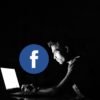 haker hacker cybeprzestępca komputer laptop Facebook logo