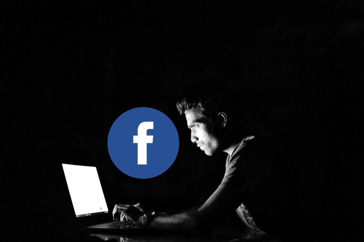 haker hacker cybeprzestępca komputer laptop Facebook logo